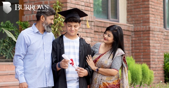 parents with their graduating child