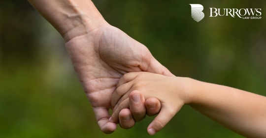 parent and child holding hands