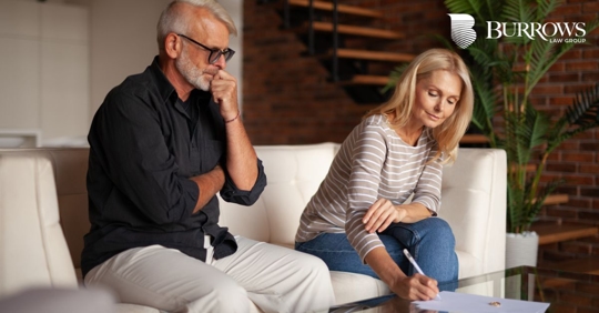 couple dividing financial assets with documents