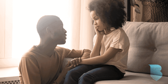 Dad talking to child